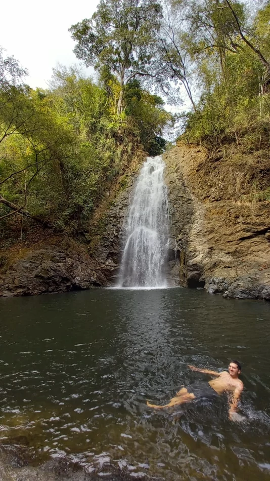 Guy bathing on the Montezuma Waterfall