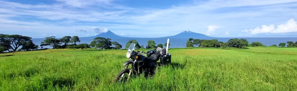 plains and volcanoes of nicaragua with a motorbike